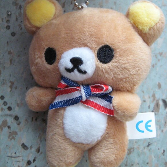 San-X Rilakkuma Blue Red White Ribbon Plush Clasp - Picture 1 of 1